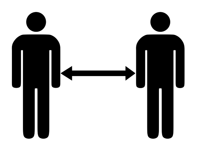 keeping-distance-from-sick-person two people keeping distance from eachother